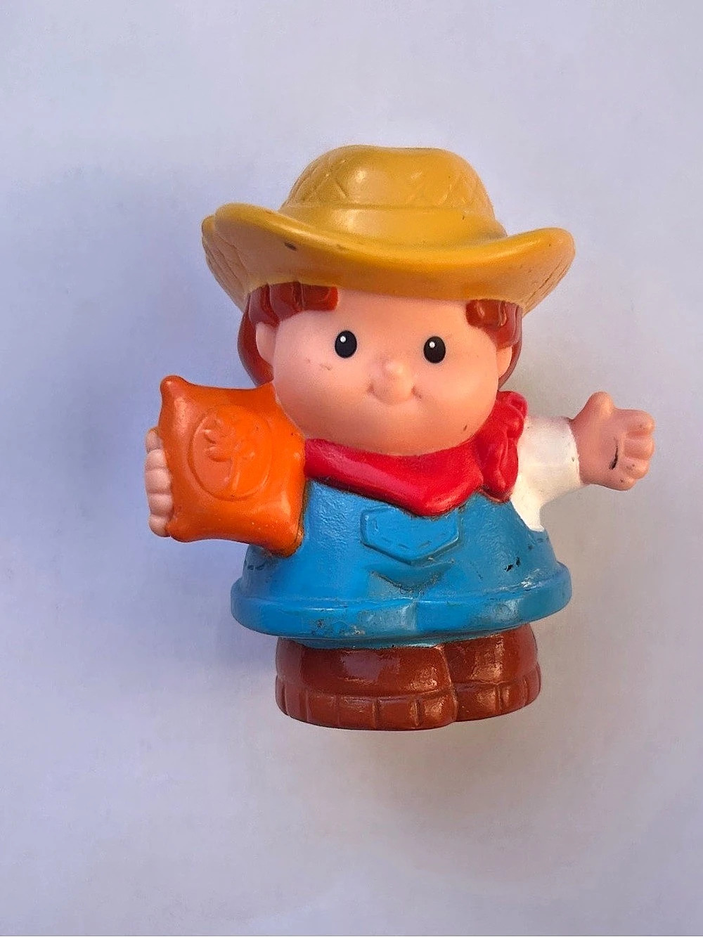 Fisher-Price Little People Farmer Figure with Feed Bag